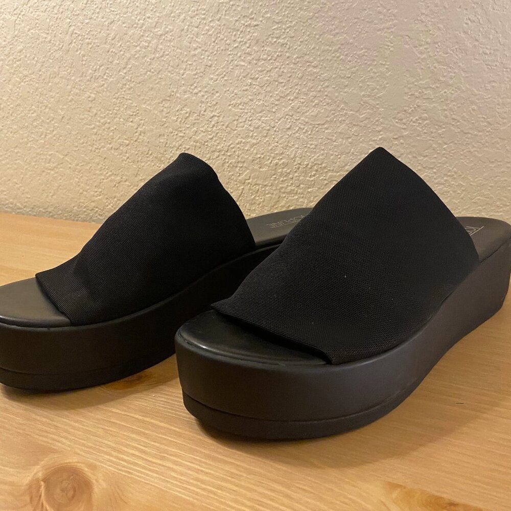 Black, platform, wedge fabric slide shoe. Platform height 1.75 inches Size 9.5